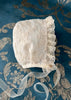 Clara tulle bonnet                                                            
Capota de tul bordado Clara